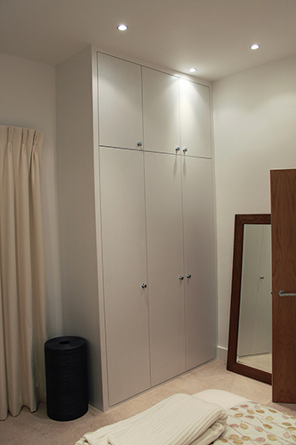 fitted wardrobe with plain doors