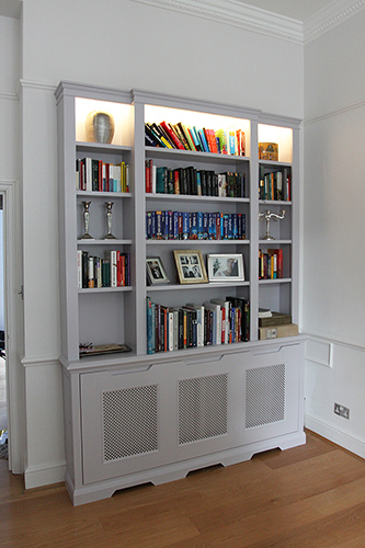 Fitted bookcase and radiator cover