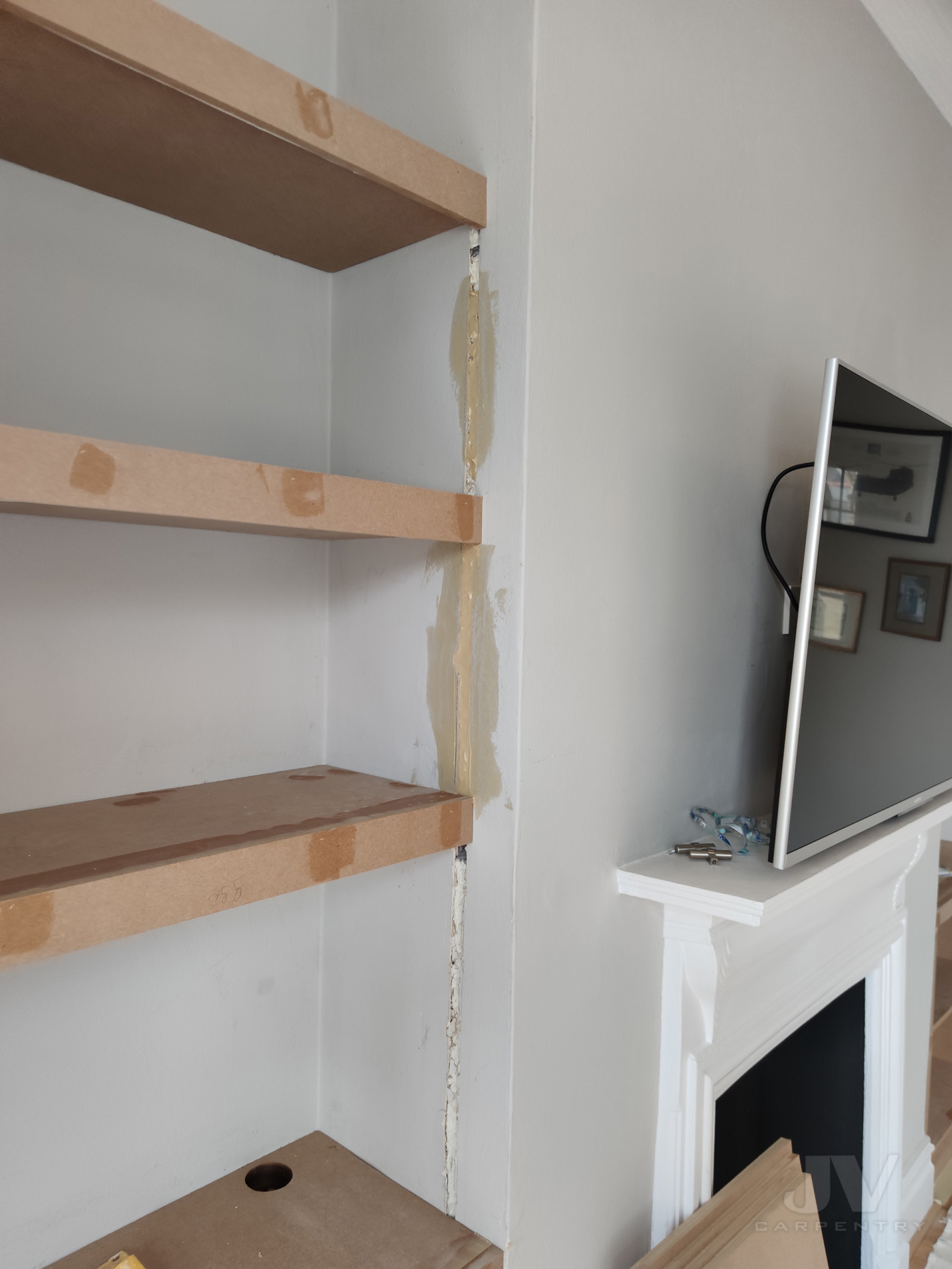 wires in the chimney for lights in shelves