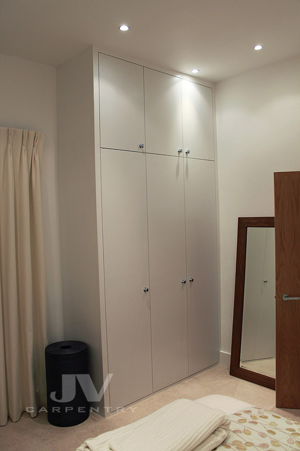 Fitted wardrobe with flush doors