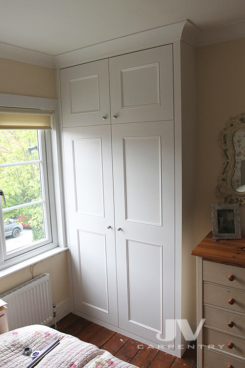 Fitted wardrobe with shaker beaded doors, traditional