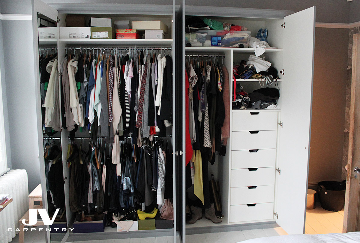 shaker wardrobe interior - drawers, hanging space, mirror at the back of the door