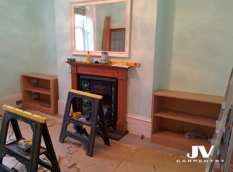 Fitting bottom cupboards into an alcove. Installation process