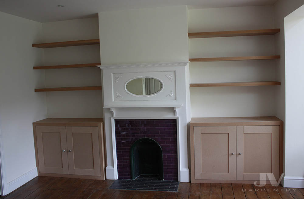 fitted alcove cupboards made out of MDF. Unpainted, before we start painting