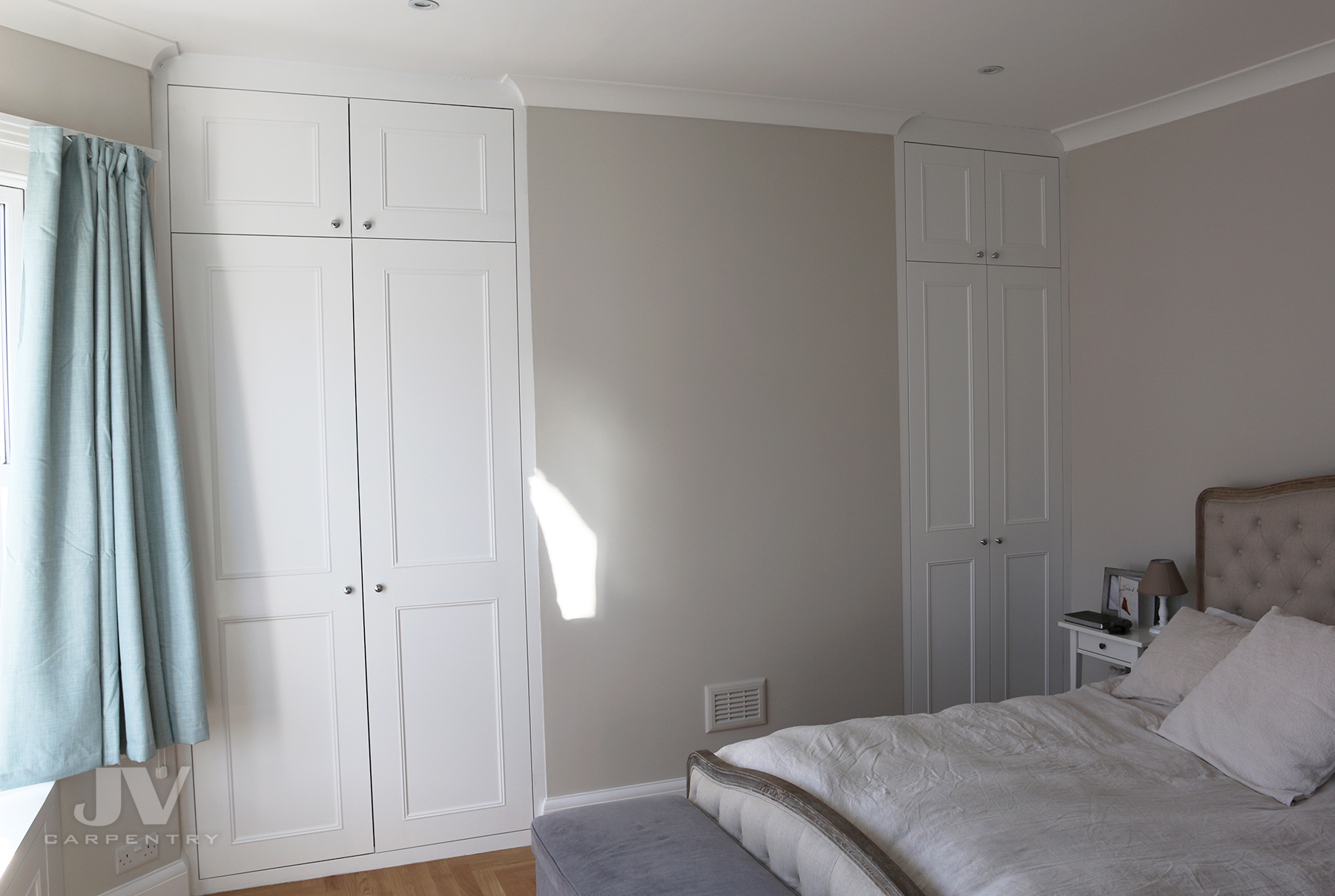 white alcove fitted wardrobes