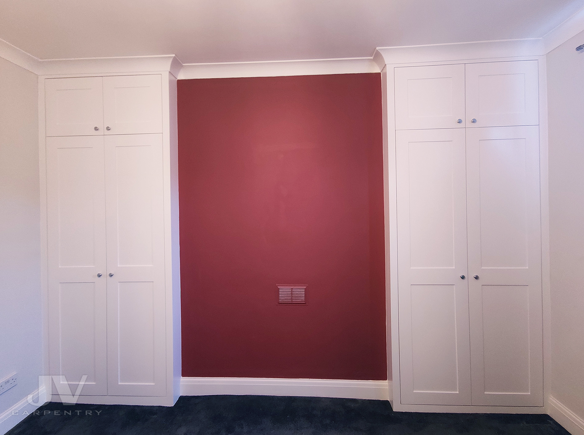 Alcove wardrobe either side of the chimney