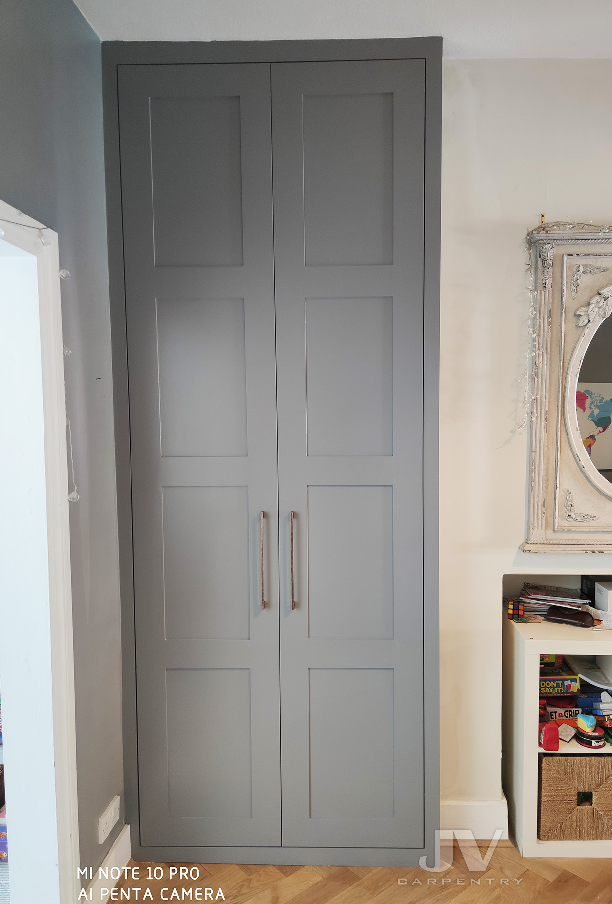 Grey alcove wardrobe