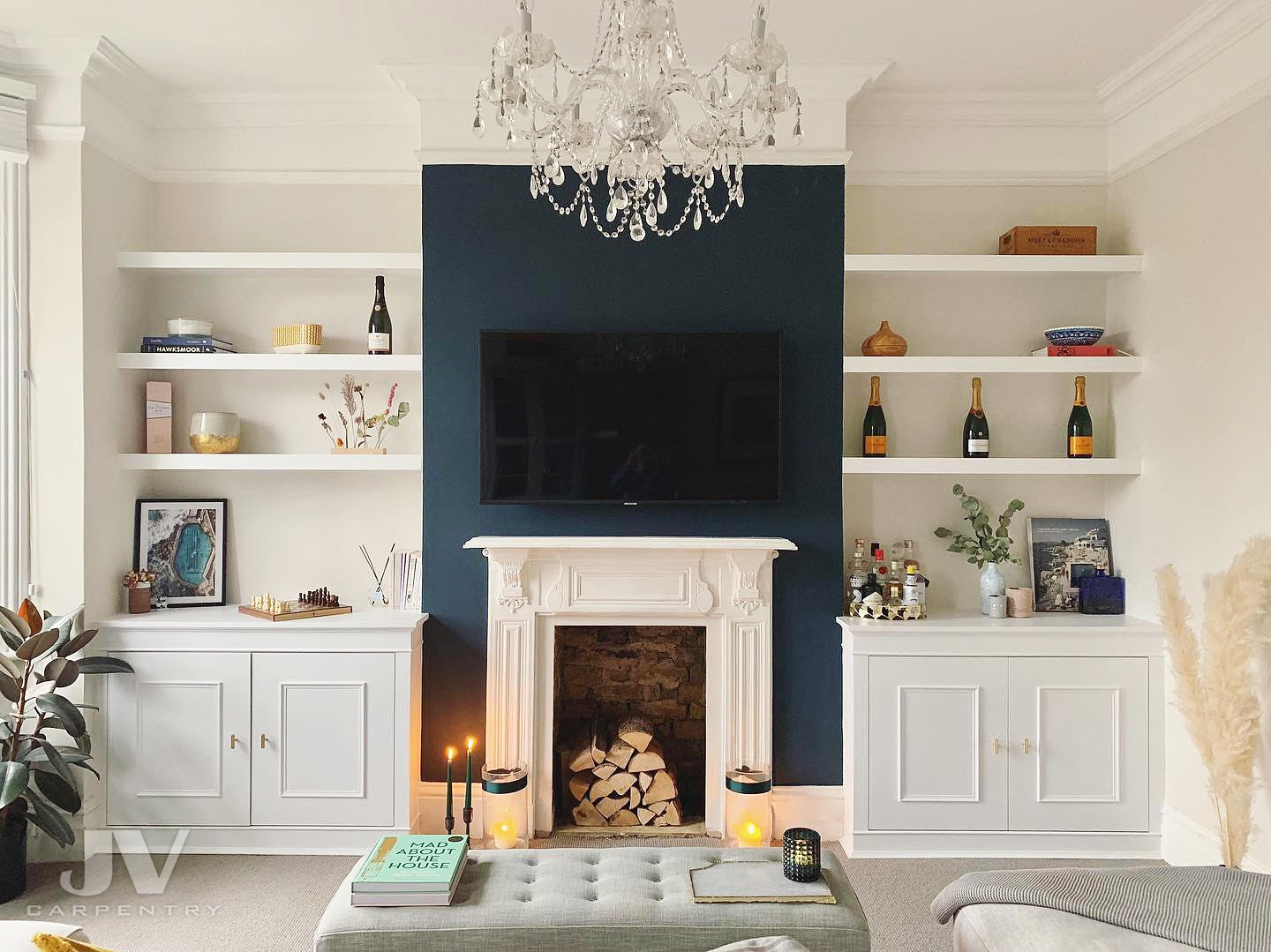 shelving and cabinets in living room alcoves