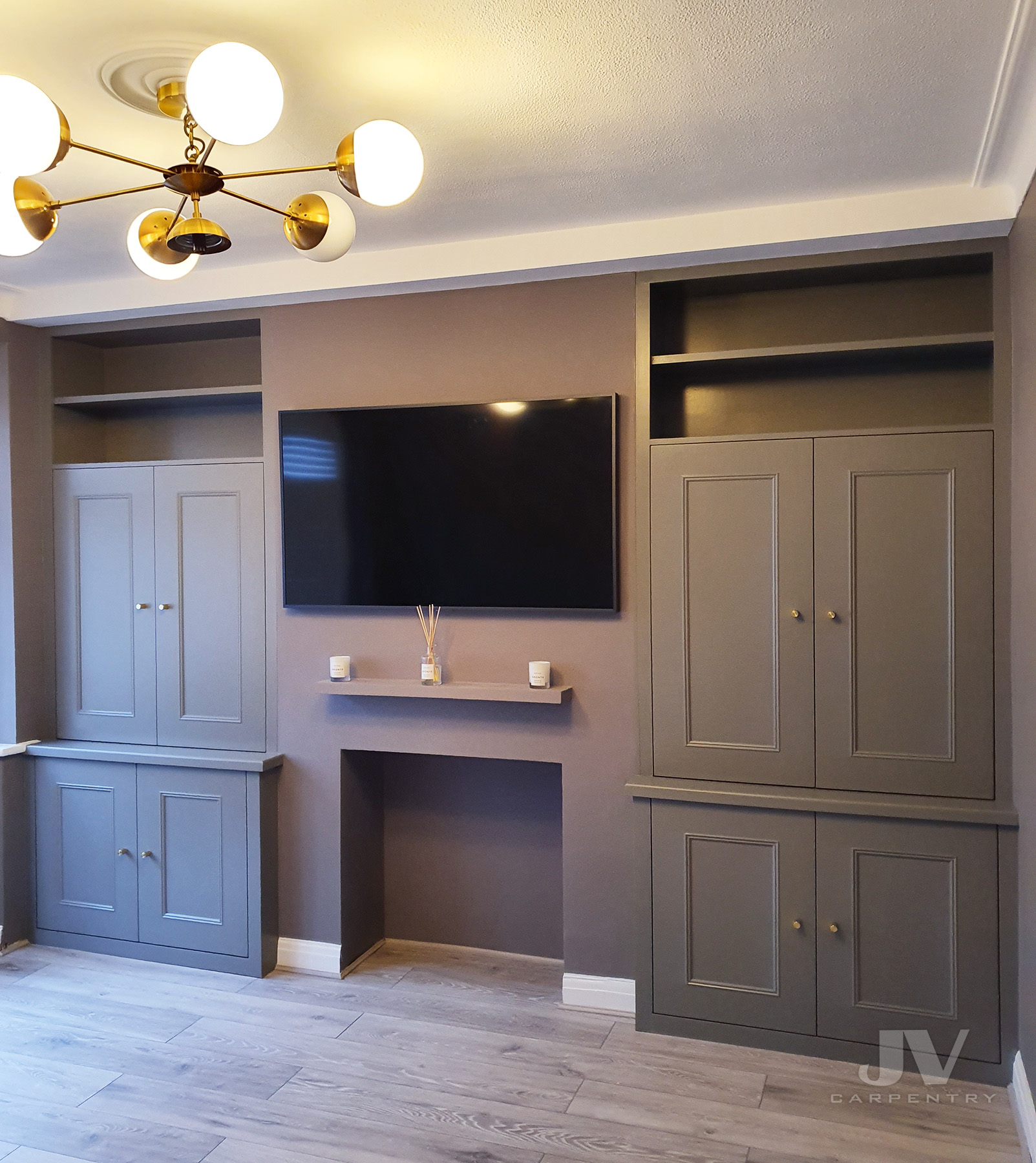 Grey alcove fitted units in living room