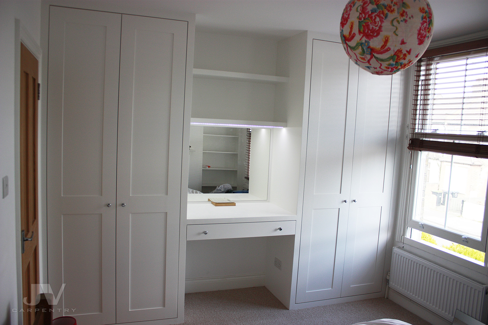 Modular wardrobe with shop dressing table