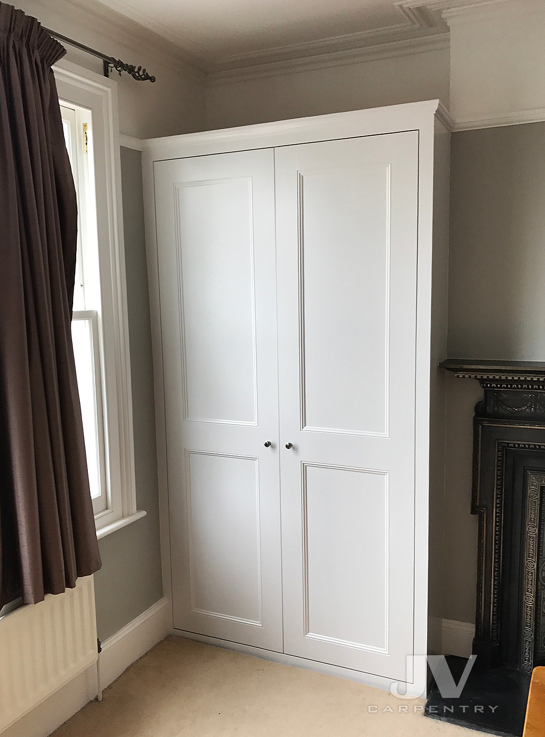Fitted wardrobe in traditional property