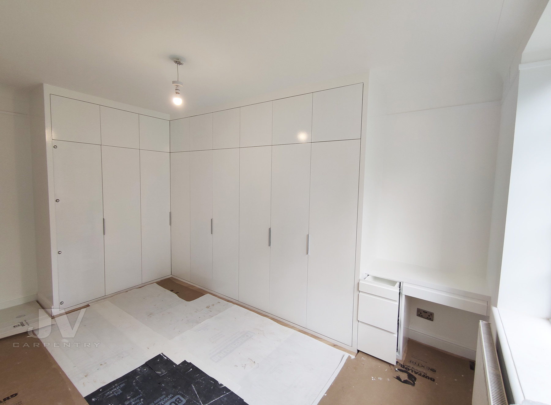 L shaped wardrobe with desk in white