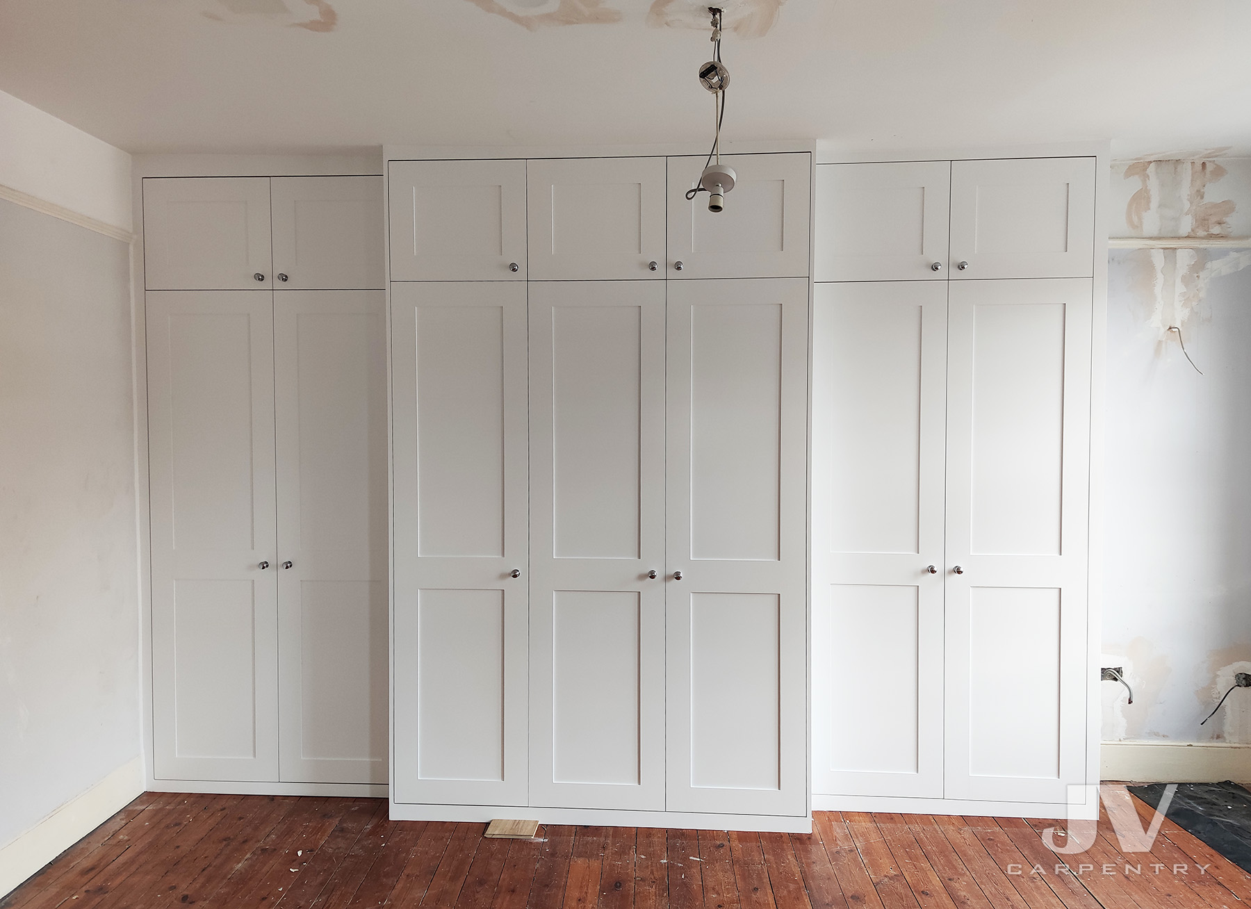 fitted wardrobe around chimney, Ealing