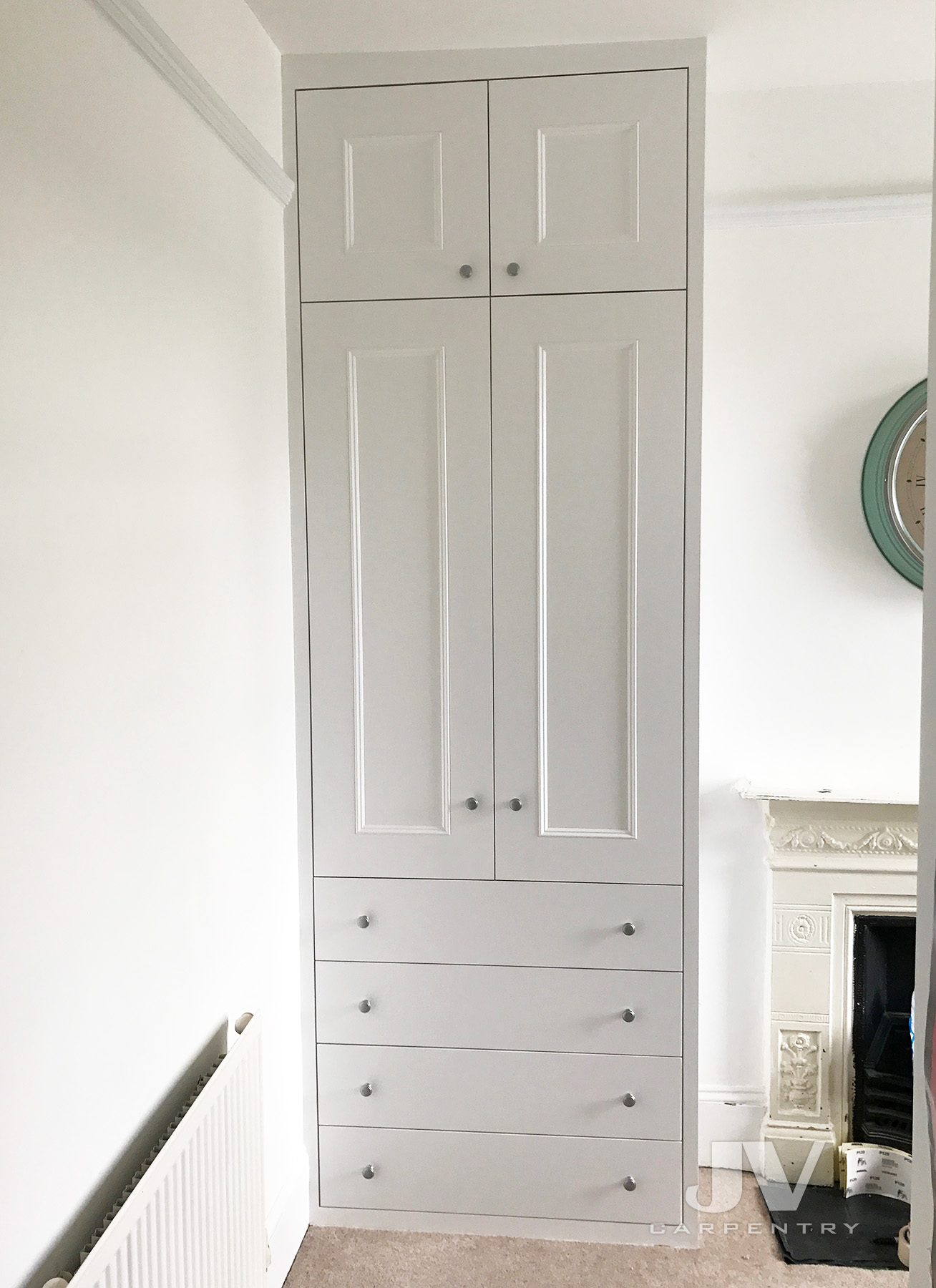 White fitted wardrobe with drawers