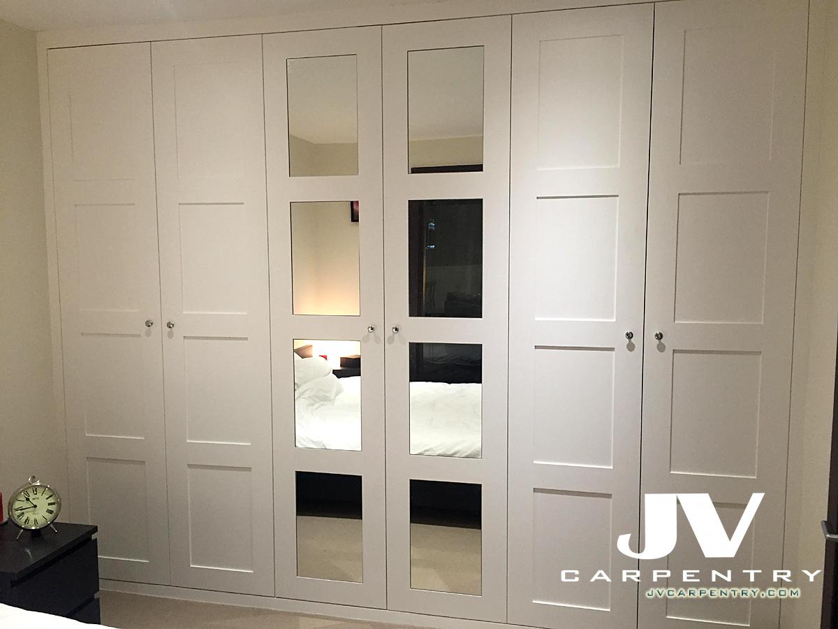 Fitted wardrobe with shaker mirrored doors