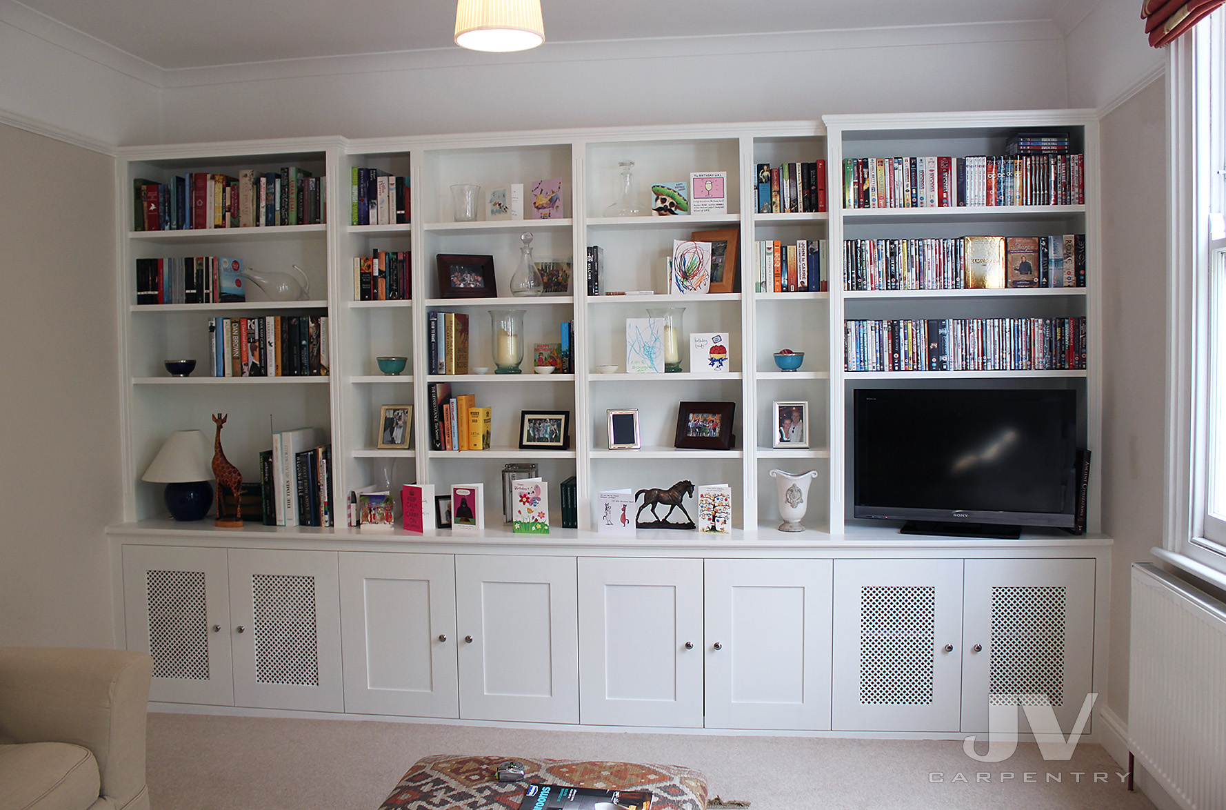 Bespoke bookshelves wall to wall