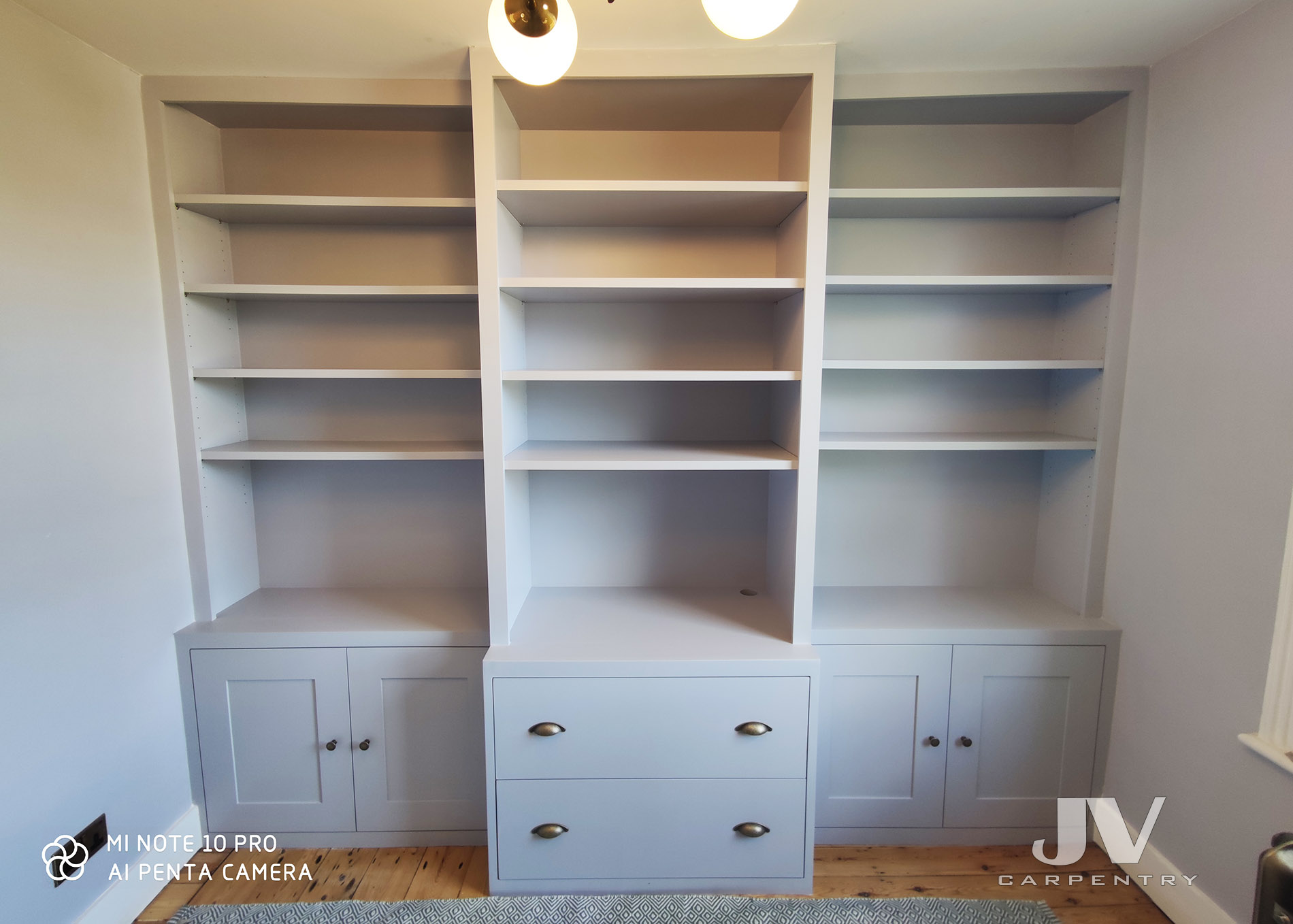 Bespoke fitted bookcase with drawers
