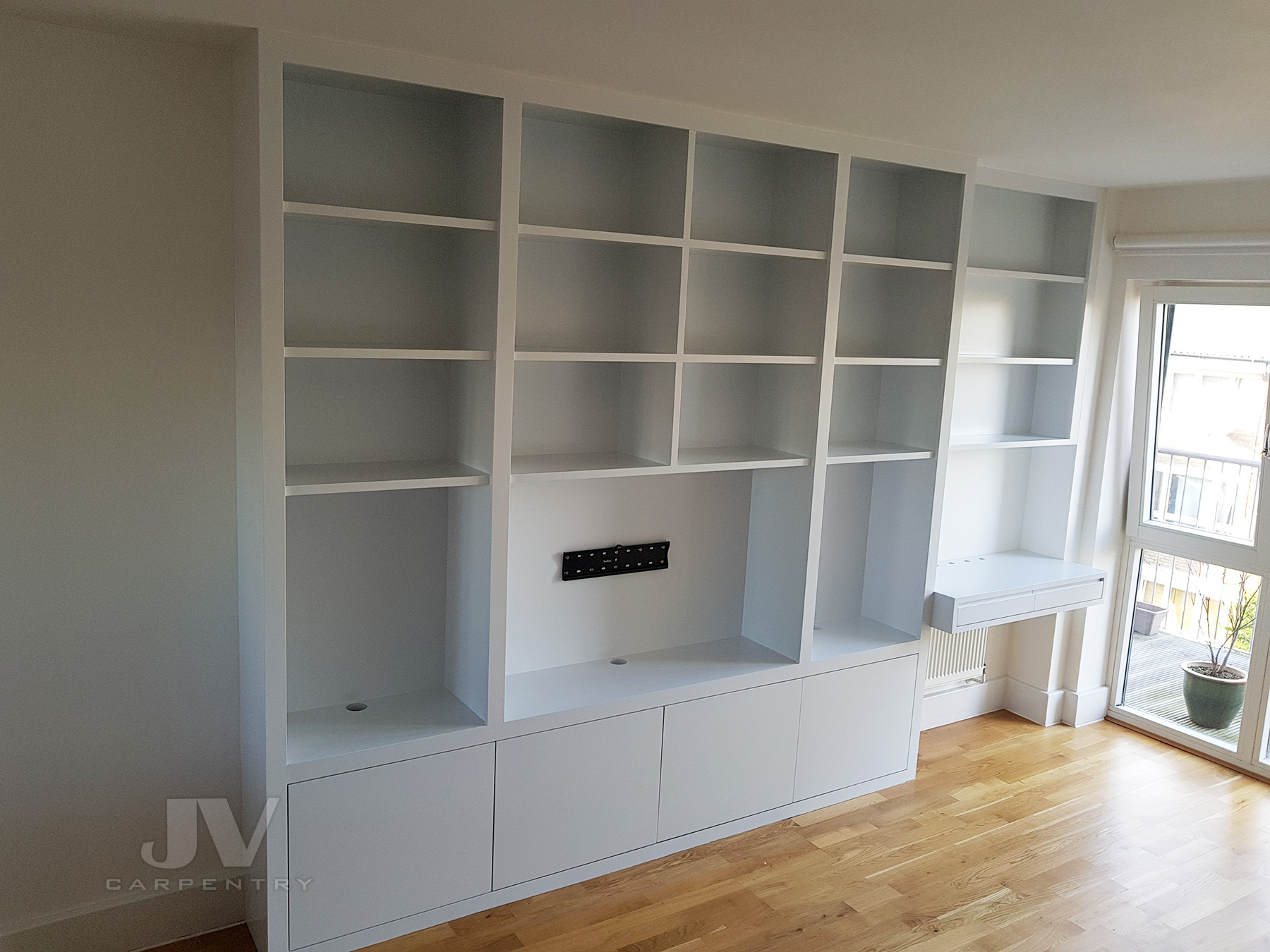 contemporary custom bookcase with desk, West London