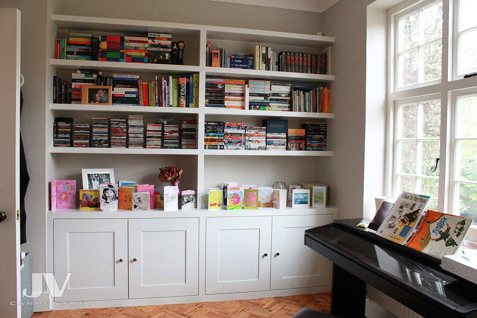 bespoke bookshelves with cabinets