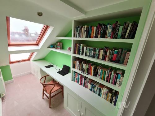 Loft bookshelves with desk space