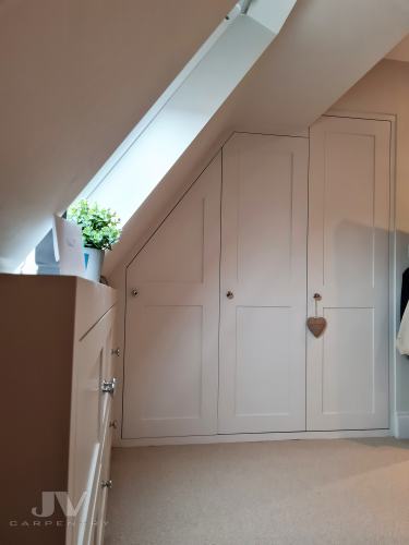 Fitted loft wardrobe in the loft