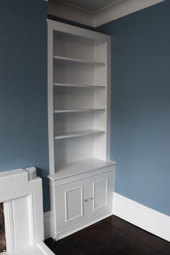 bookshelves with cupboard