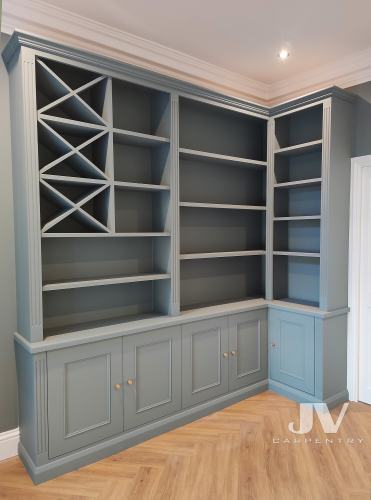 Corner L shaped fitted bookshelves