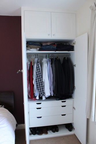 Alcove wardrobe with small drawer for ties  