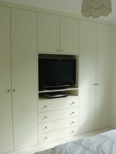 Fitted wardrobe with TV area