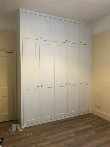 Tall custom wardrobe with 5 doors